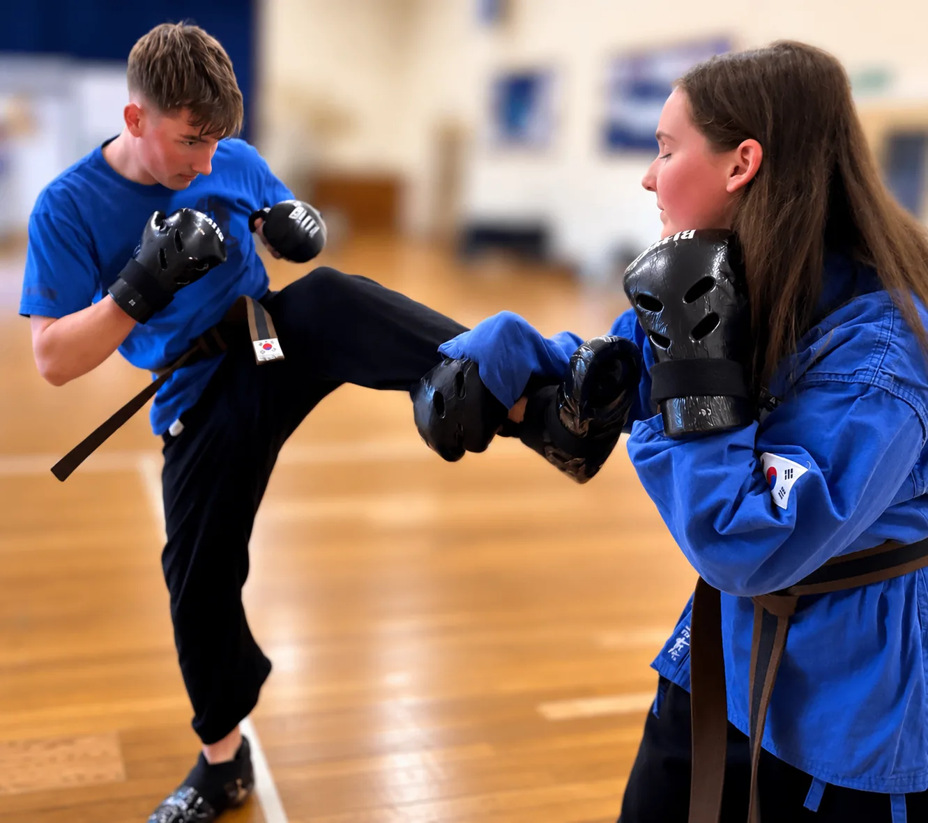Teen students practising Choi Kwang Do together in the Teddington dojo